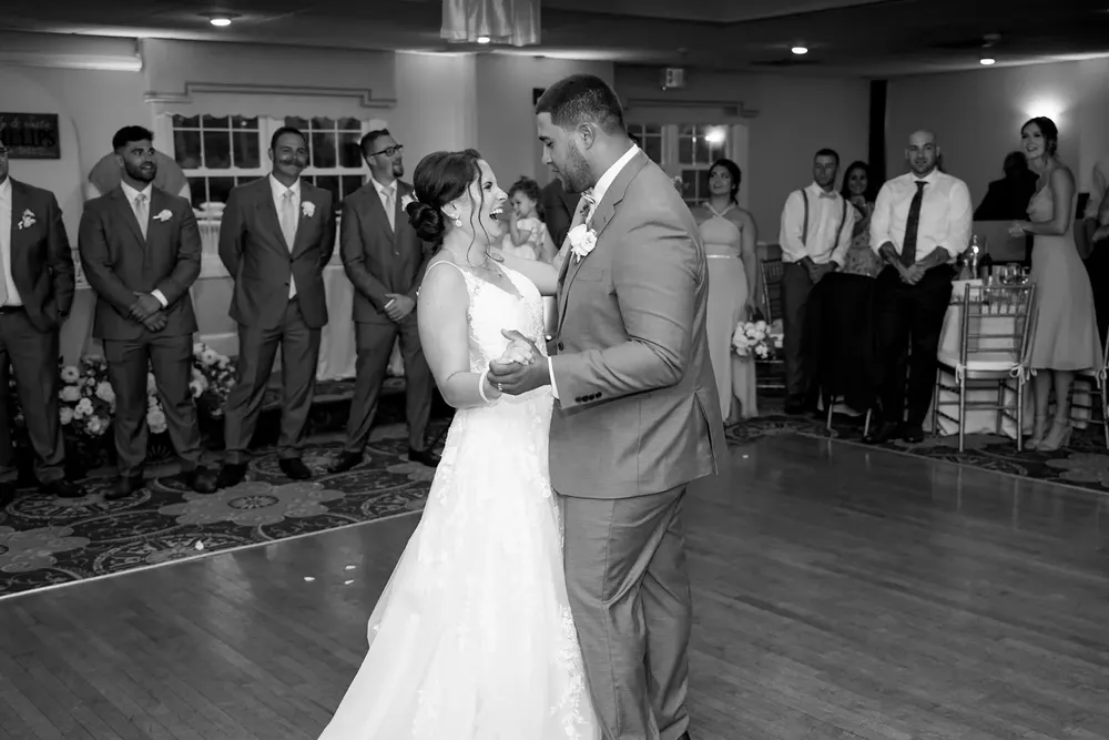 Black and white photo of the couple's first dance